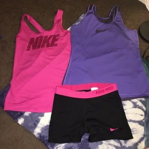 Two Nike pro workout tops w/dri fit spandex